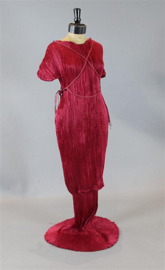 A rare Mariano Fortuny rose red finely pleated Delphos three quarter length tunic and matching full length skirt,